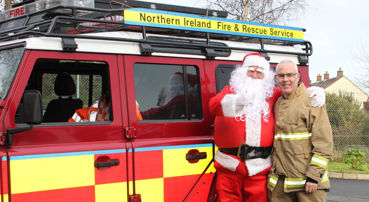 Santa Claus with helper from Fire & Rescue